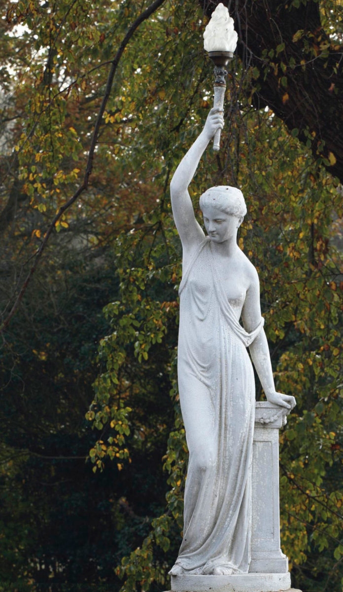 Eine gusseisenfigur mit Fackel - Piet Jonker